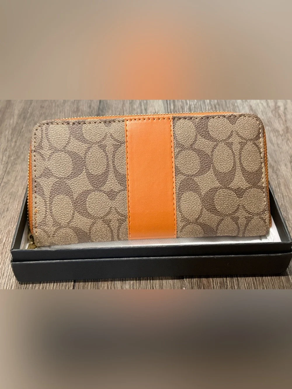 Brown Signature Canvas Wallet with Orange Leather Strap and Gold C
